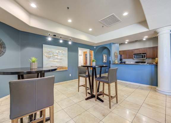 Tresa at Arrowhead Apartments Clubhouse Lounge with Seating and Kitchen