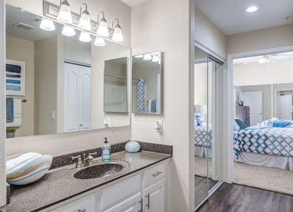 Tresa at Arrowhead Apartments Model Bathroom and Bedroom
