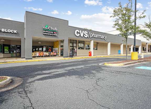 A CVS Pharmacy is located in a strip mall with a Burger King and H&R Block.