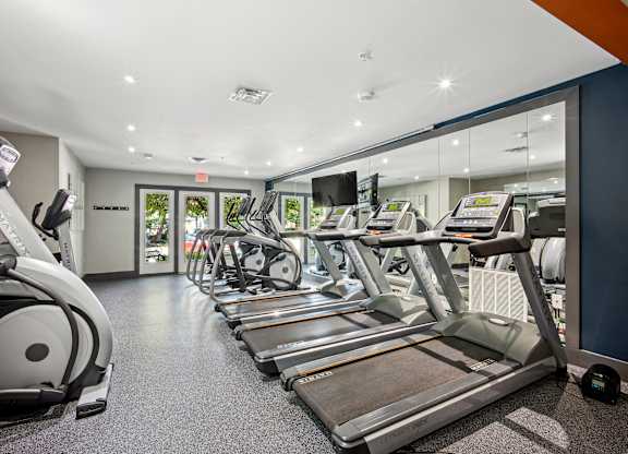 A gym with treadmills and elliptical machines at Elme Bethesda, Bethesda, 20814
