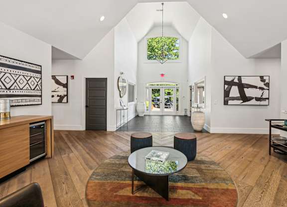 A living room with a rug and a coffee table  at Elme Marietta Apartments, Marietta, GA