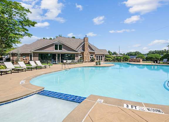 A swimming pool with a 3 feet depth marking  at Elme Marietta Apartments, Marietta, GA