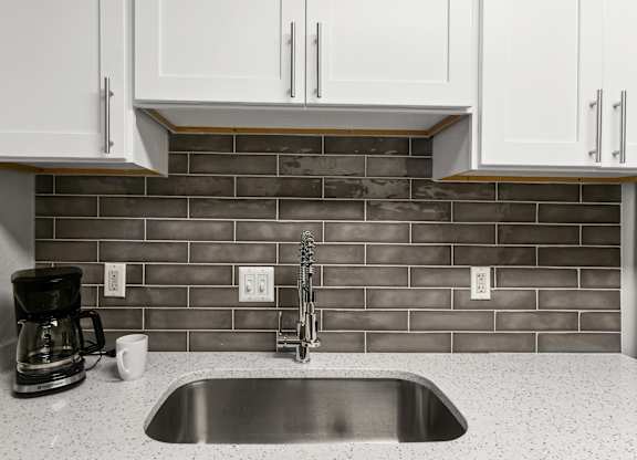 A kitchen at Elme Sandy Springs Apartments, Atlanta, GA, 30350