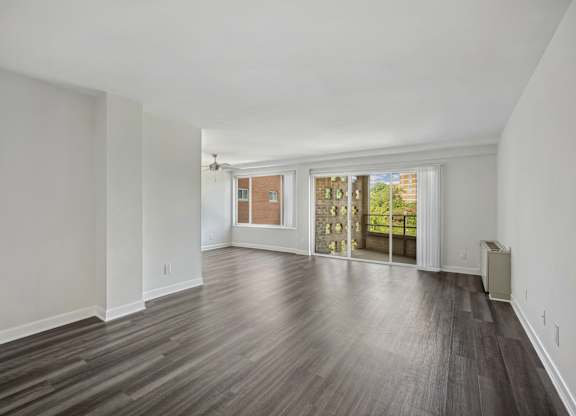 A room with wooden floors and white walls at Wellington Apartments, Arlington, Virginia