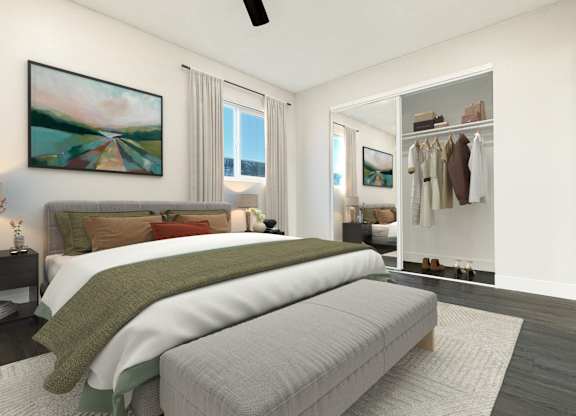 A bedroom with a large bed and a painting on the wall.