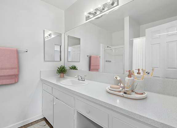 Spacious bathroom in oversized vanity in 1005 Via Zapata apartment home attached to primary bedroom