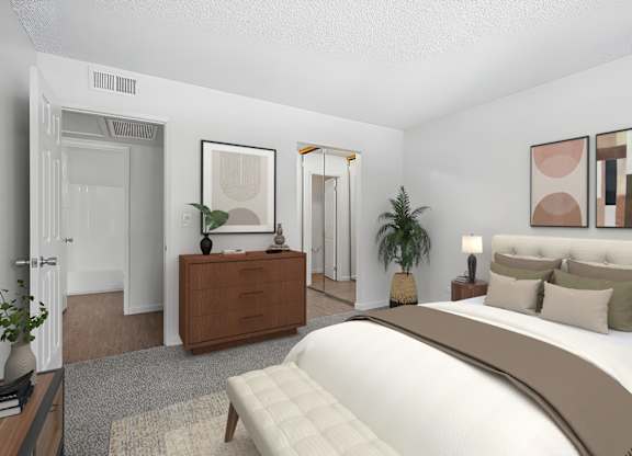 Primary bedroom in 1005 Via Zapata 2 Bedroom apartment home with plush carpeted flooring, large windows, private bathroom and spacious closet.