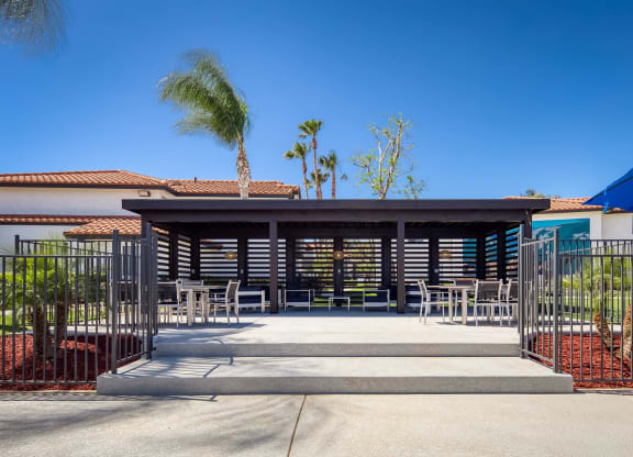 Sitting area in pool area at Sixteen60 Apartment Homes, San Bernardino, California