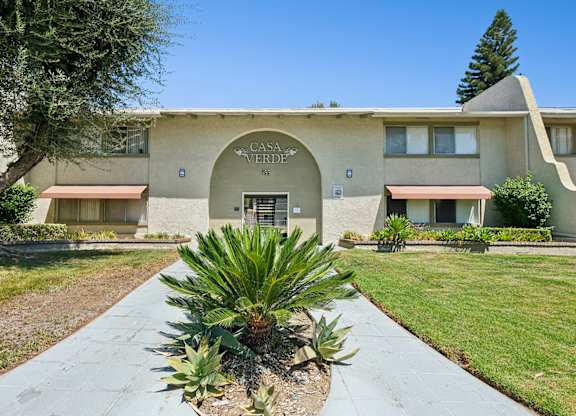 Charming exterior of Casa Verde at 955 Via Zapata with spanish style architectural details.
