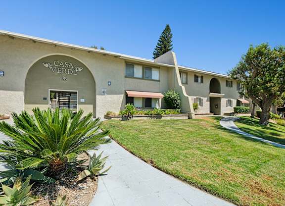 Charming exterior of Casa Verde at 955 Via Zapata with spanish style architectural details.