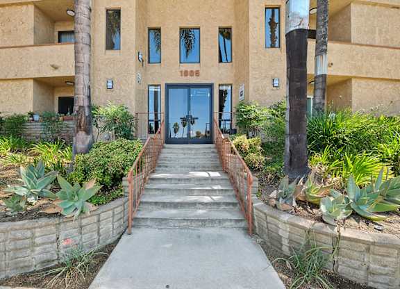 Casa Verde exterior at 1005 Via Zapata surrounded by lush greenery