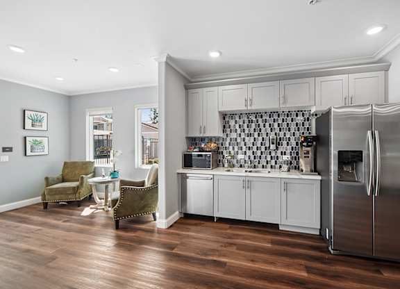 Kitchenette and charming seating area in Turtle Creek leasing office/community clubhouse