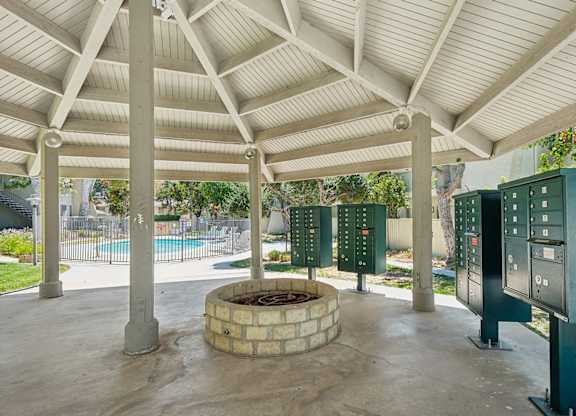 Covered Patio Area at 955 Via Zapata with mailboxes and fire pit