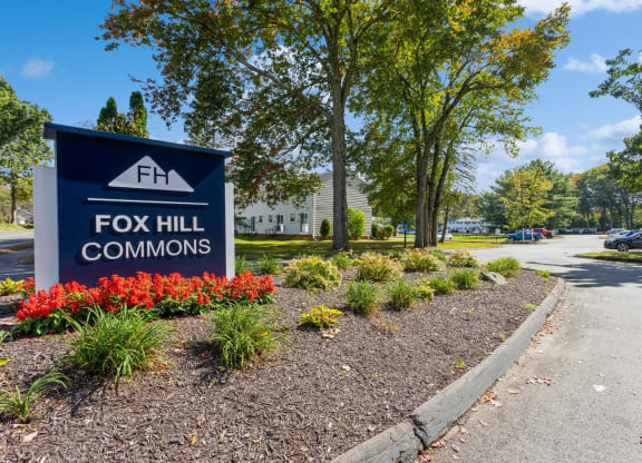 a sign of Fox Hill Commons at the entrance of the apartment complex at Fox Hill Commons, Connecticut