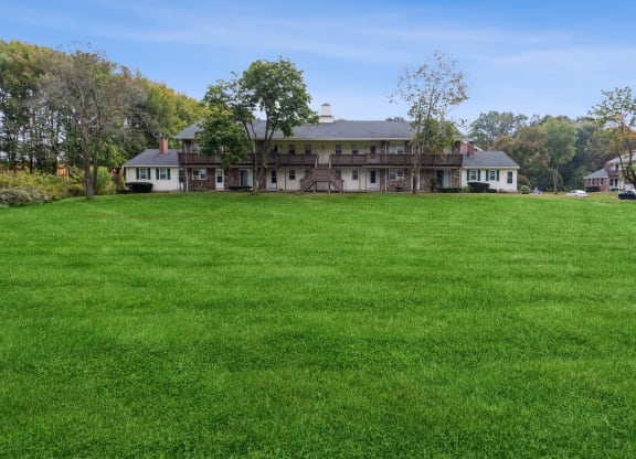 a large lawn in front of the Stonebridge apartment at Stonebridge, Connecticut