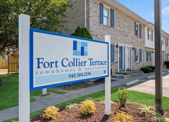 a sign that says fort collier terrace townhomes and apartments at Fort Collier Terrace, Winchester, VA