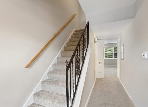 a flight of stairs leading to the first floor at The Hinsdale, Hinsdale, 60521
