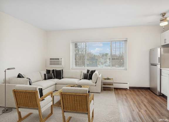 A living room with a couch, chairs, and a window.