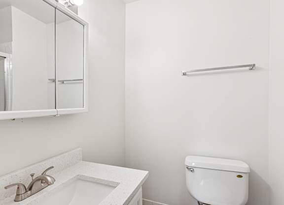 Bathroom with a sink and mirror