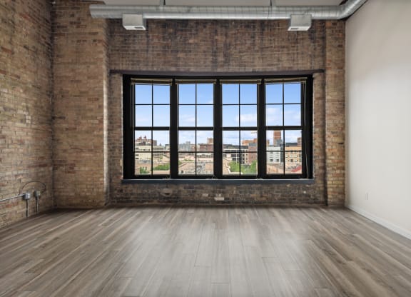 an empty room with a large windowat Gaar Scott Historic Lofts, Minnesota