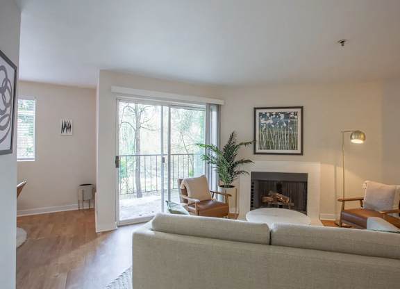 Living Room With Balcony and fireplace at Miramonte Lodge, Milwaukie, OR