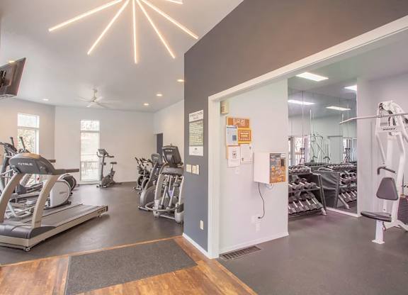 Gym with treadmills and other exercise equipment at Miramonte Lodge, Milwaukie, Oregon