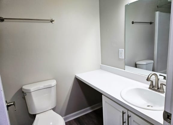 Bathroom with sink and mirror