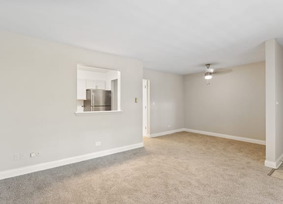 a bedroom with a large window at The Hinsdale, Hinsdale