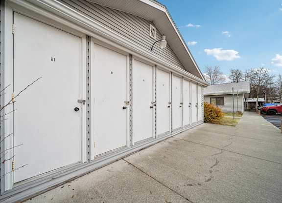 A building with numbered doors 8 and 12.