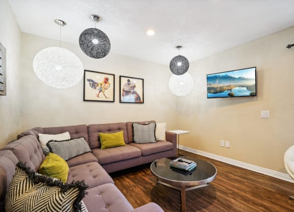 a living room with a couch and a table