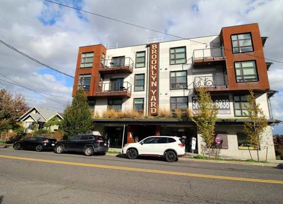 Mixed use building with ground level parking at Brooklyn Yard Apartments, Portland, 97202