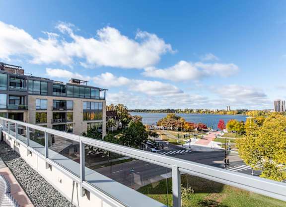 Balcony view overlooking and autumn foliage at 1800 Lake Apartments, Minneapolis, MN