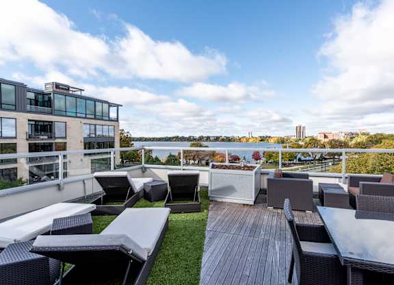 Rooftop lounge with seating and views at 1800 Lake Apartments, Minneapolis, 55408
