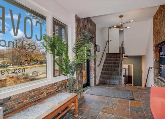 A house with a staircase leading to the second floor.