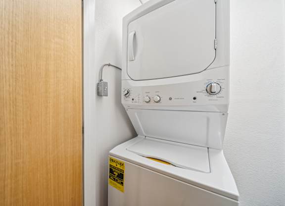 A white dishwasher is installed in a kitchen.
