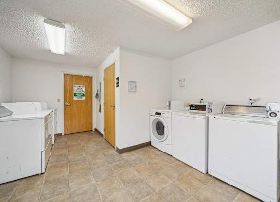 A laundry room with a washer and dryer.