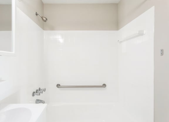 a bathroom with a shower and a sink and a towel rack at Stonebridge, Connecticut