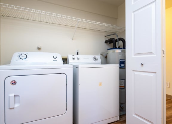 the laundry room is equipped with washer and dryers at Murrayhill Park, Oregon