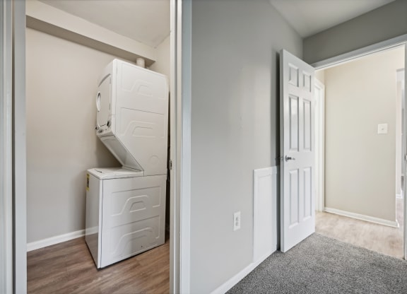 a laundry room with a washer and dryer at ReNew Odenton