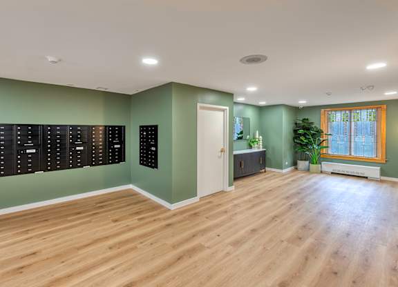 Large room with mail slots on the wall. at Oak Park City, Oak Park Illinois
