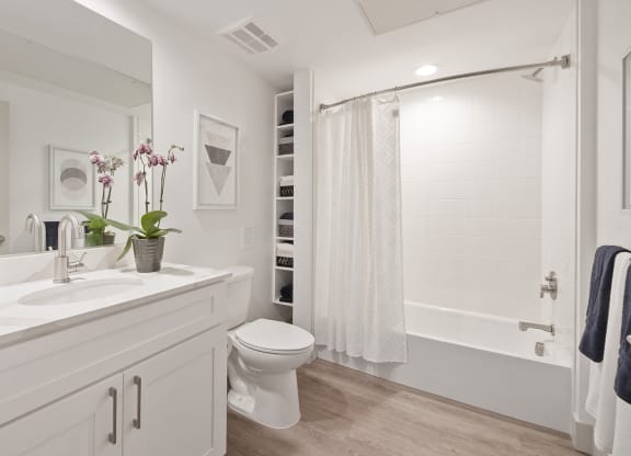 a bathroom with a shower and a sink and a toilet at Arrive Los Carneros Apartments, Goleta, CA, 93117
