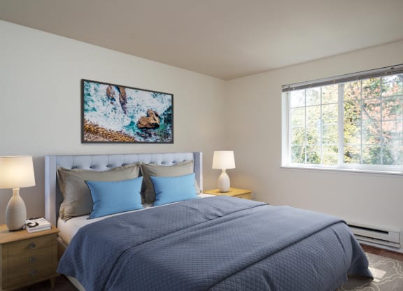 a bedroom with a bed and a window at Sundial Apartments, Oregon
