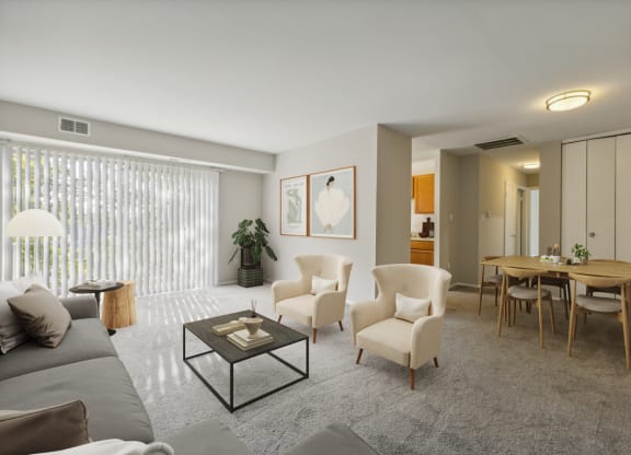 Living room with a couch and chairs and a dining room table at Briarwood Apartments, Dumfries, VA, 22026