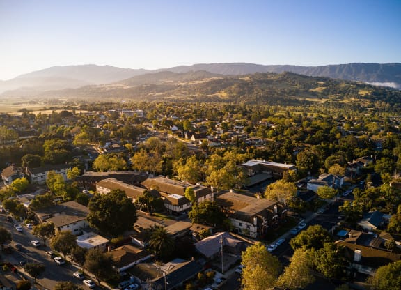 a view of the city of palm springs from above at Oak Park Apartments, Solvang, CA