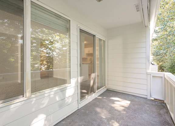 Large balcony with sliding door