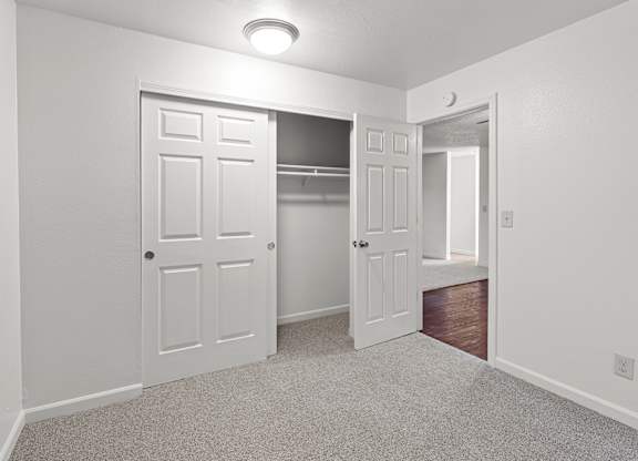 A white door with a small window above it.