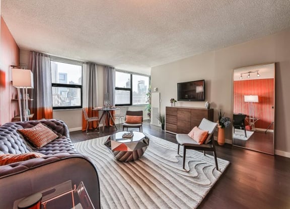 Living room with couch, table and lamps at West77, Chicago, IL, 60654