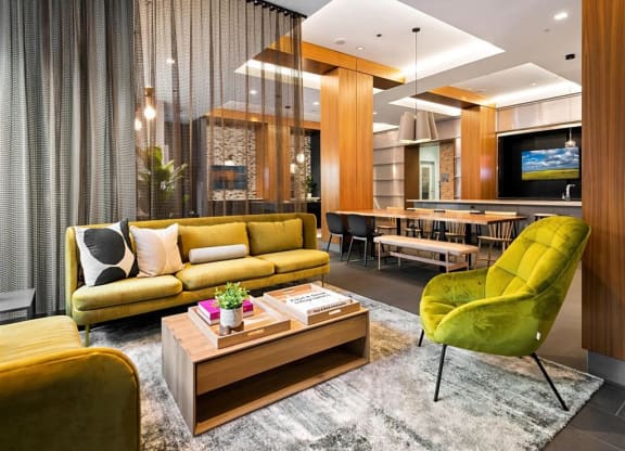 Living room with couch, table and lights at West77, Illinois