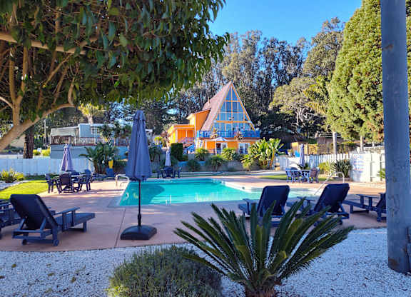 View of the pool and cabin at Salinas Sunset Apartments, Salinas, CA