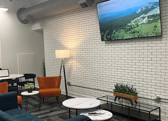 interior seating area with view of wall mounted tv